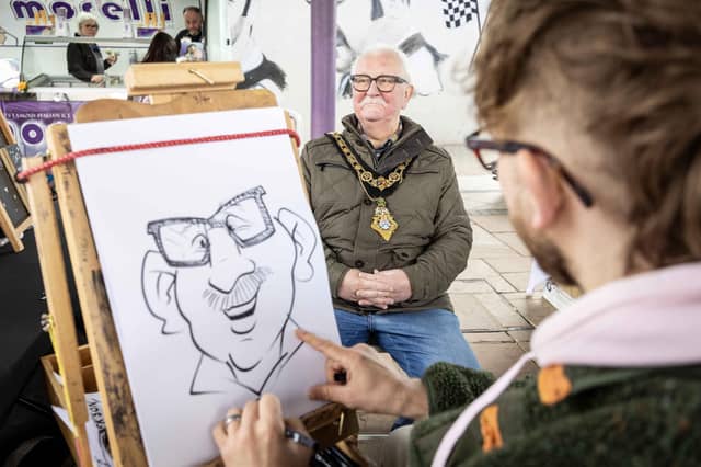 Mayor of Causeway Coast & Glens Borough Council Cllr Oliver McMullan joined the crowds at the Ballymoney Spring Fair on Friday and sat for this artist.