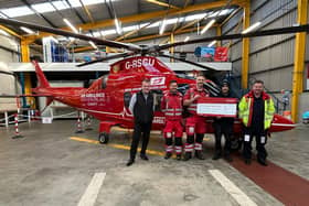 Thomas McPeake made a donation to the charity Air Ambulance NI after conducting a fundraising effort at Banagher Glen, Dungiven. (Pic: Contributed).