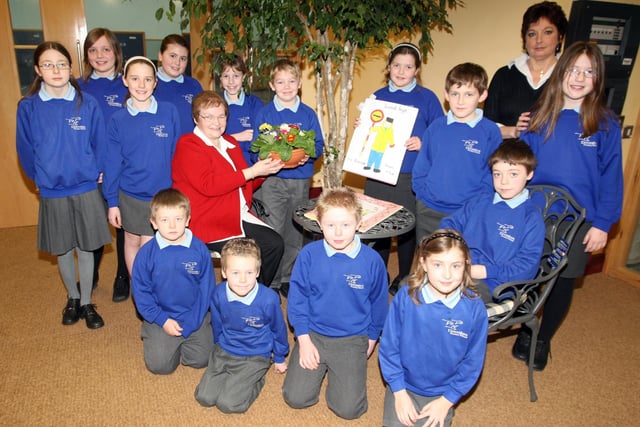Downshire Primary School patrol lady Mrs Muriel Ervine who retired in 2007 after 30 years at the school received her gift of a Garden Patio set from pupils and Vice Principal Mrs Barbara Lewers
