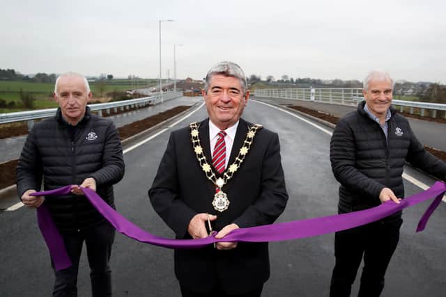 Former Mayor Billy Webb, Ciaran Murdock and Paul O’Rourke at the opening of the first section of the Ballyclare relief road in 2021.