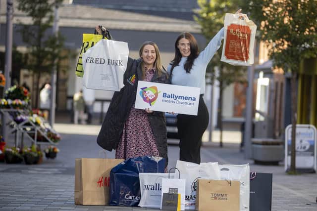 BID manager Emma McCrea and Clare Moore BID Officer, get ready for Discount Day.
