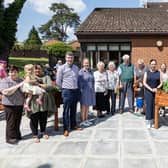 Staff and residents of Stronge House in Portadown, part of the Clanmill Group, celebrating the refurbishment of their home.