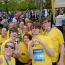 Aquinas College students and staff who ran for N. Ireland Kidney Research Fund enjoy making memories on Sunday at the Belfast Marathon.