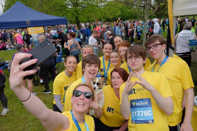 Aquinas College students and staff who ran for N. Ireland Kidney Research Fund enjoy making memories on Sunday at the Belfast Marathon.
