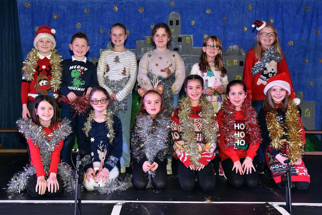 Pupils who narrated the Hamiltonsbawn Primary School nativity play, A Twinkly Christmas. PT50-709.