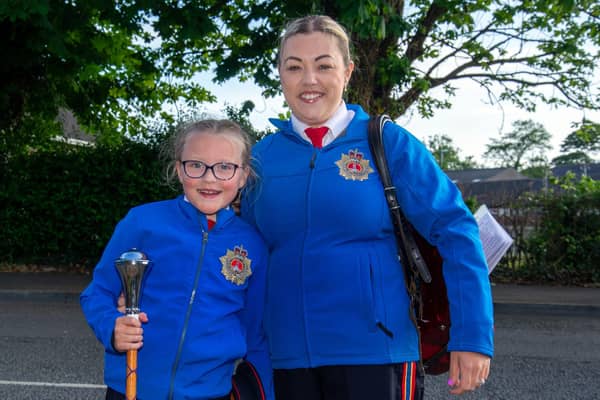 Mother and daughter members of Mullabrack Accordion Band, Sarah Compston and Eliza (8) pictured at the band's annual parade. PT23-203.