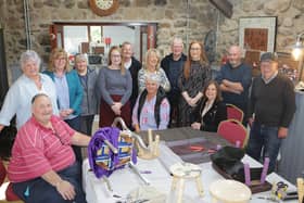 Pictured at the upholstery workshop in The Mill at Cloughmills are members of Cloughmills Community Action Team, Eilish McGarry, Freda McKnight, Wilbert Smyth, Harry Devlin, Eamon O’Toole, Margaret Anne Reid, Gerald Connelly and Muriel Whitten. They are joined by Deirdre Casey, Ballymoney Housing Team, Anna Margaret Jamieson, Workshop Tutor and Jim Whitten, Secretary of Cloughmills Community Action team, Lynsey Quinn, Housing Executive Patch Manager, and Joanne White, Housing Executive Team Leader. Credit NIHE