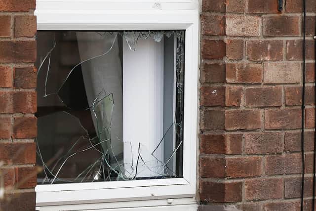It was reported that a brick was thrown through a window. Press Eye - Belfast