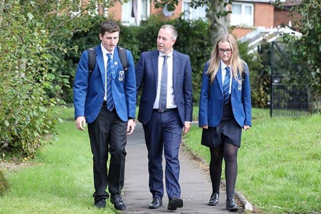 Education Minister, Paul Givan MLA chatting to pupils at St Columbanus College, Bangor. (Pic: Contributed).