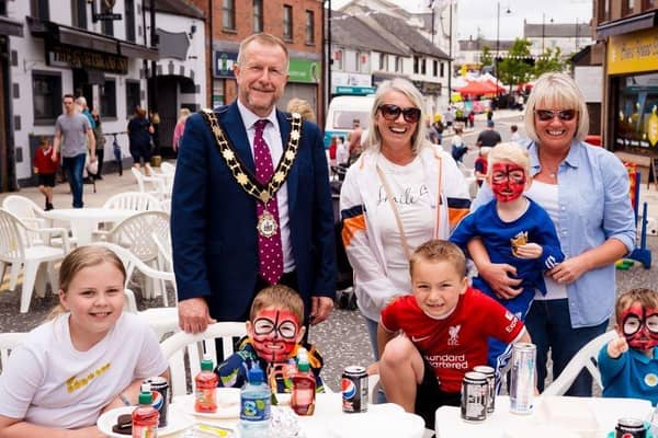 Families gathered to celebrate May Fair Day on Ballyclare Main Street.