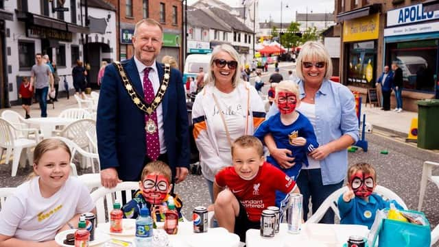 Families gathered to celebrate May Fair Day on Ballyclare Main Street.