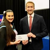 Amy receiving her award from Kyle Robinson, who was the guest speaker at the awards.  Photo: Greg McCready