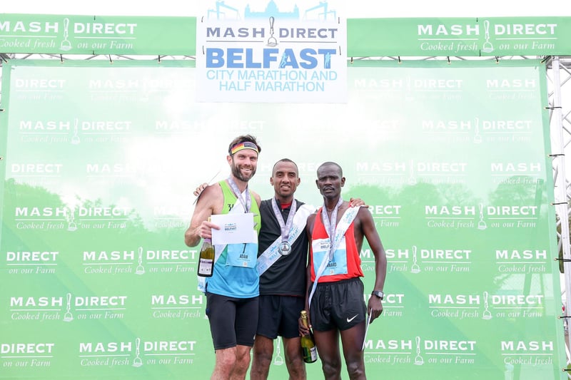 Overall men's winners, from left.  Adam Bowden in second, Mohamed Oumaarir in first and Bernard Rotich in third.