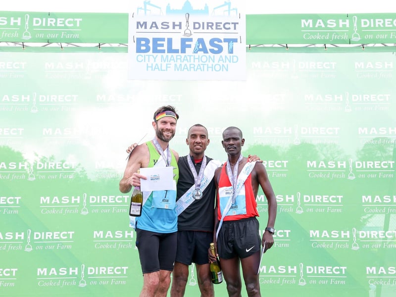 Overall men's winners, from left. Adam Bowden in second, Mohamed Oumaarir in first and Bernard Rotich in third.