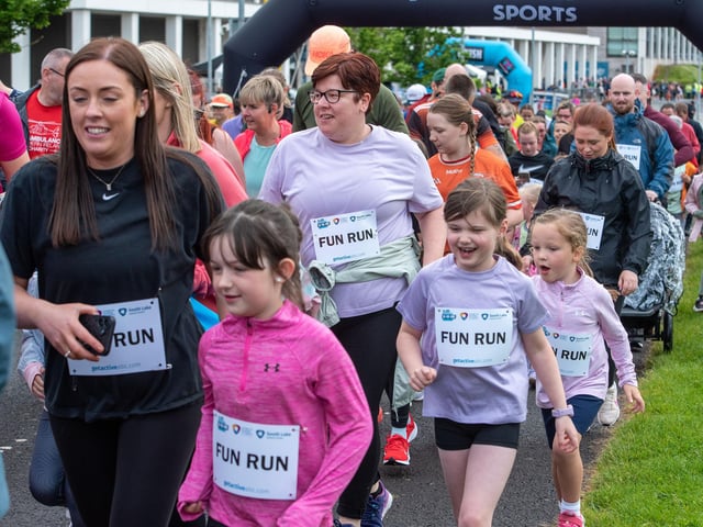 Taking part in the family fun run.