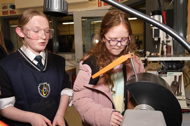Getting ‘hands on’ under the close eye of one of the students the Sperrin Integrated College Open Night.
