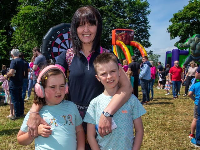 Members of the Harris family who enjoyed the fun at the Drumcree Parish Garden Fete on Saturday.Included are from left, Isabella (10), mum, Helen and Samuel (10). PT23-224.