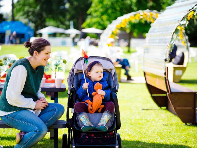 Eleanor and her mum enjoying some snacks and live music.