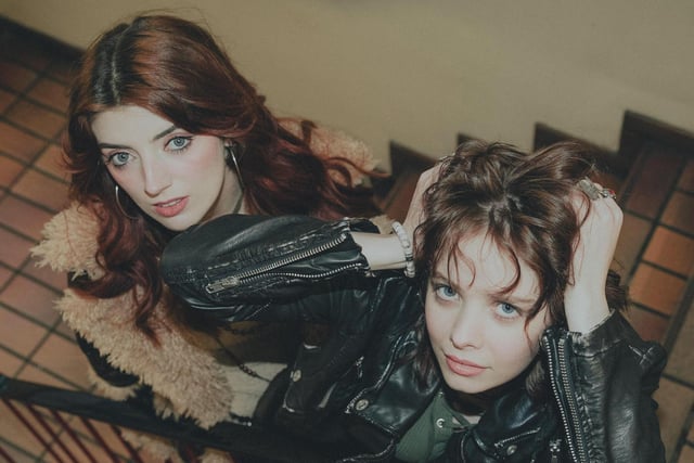 Inspired by the Beatles, Fleetwood Mac and Led Zeppelin, Dea Matrona is a Belfast-based Irish rock band, led by frontwomen and school friends Mollie McGinn and Orlaith Forsythe.  From humble beginnings busking in the Northern Irish capital, Dea Matrona has now reached over 70,000 monthly listeners on spotify since entering the music scene in 2018. The band came out with their hugely successful debut album, For Your Sins, this year after supporting Kris Barras and Foo Fighters’ Chris Shifflet on UK and Ireland tours in 2023. With their rapid growth in the last year, Dea Matrona is quickly heading towards worldwide recognition. To stream their music, go to open.spotify.com/artist/2mjBLM7k51GwUPhN1miEHY