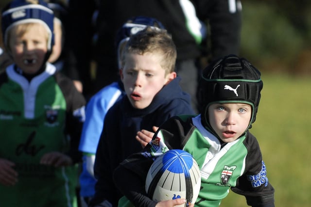 This City of Derry youngster sets his sights on the Ballymoney try line during their mini-rugby match back in 2011.