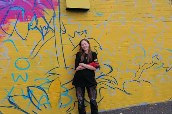 Hannah Constance pictured as work on the new mural continued in Newtownabbey. (Pic: NI World).