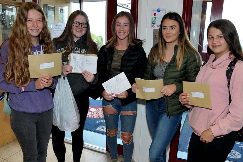 Leah Cambridge, Megan Boyd, Carly-Louise Kennan, Caitlin Ingram and Erin Johnston with their GCSE results at Carrickfergus Grammar in 2018. INCT 34-202-AM