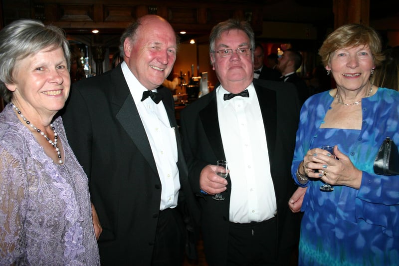 All smiles for the camera at a 70th Anniversary Dinner Dance for the Robinson Board at Ballymoney Rugby Club back in 2007