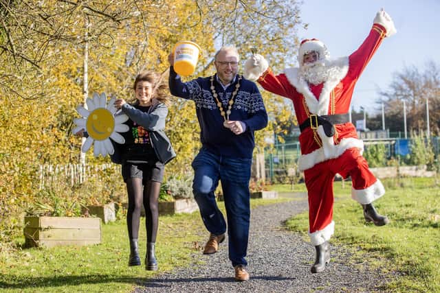 Mayor of Lisburn & Castlereagh City Council, Councillor Gowan pictured with Beth Black, Fundraising & Events Administrator, Cancer Fund for Children and Santa Claus to launch the Santa Dash at Lough Moss Leisure Centre, which will take place on Wednesday December 13 at 6.30pm. Pic credit: McAuley Multimedia