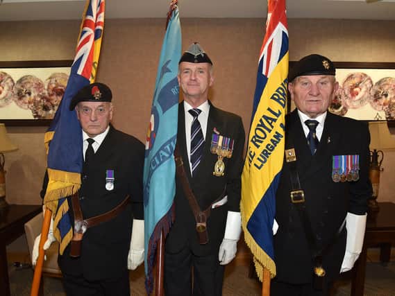 RBL standard bearers at the Festival of Remembrance in Craigavon Civic Centre including from left: Kenny Adair, Donaghcloney RBL, Andrew Conn, RAFA NI, and Mervyn McAleese, Lurgan and Brownlow RBL. PT44-200.
