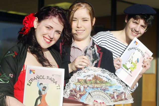 Naomi McReynolds, Ashleigh Davidson and James Storey from Wallace High's Young Enterprise Company "Ambition" with their language book which won the Best Product Award at a Trade Fair in 2006