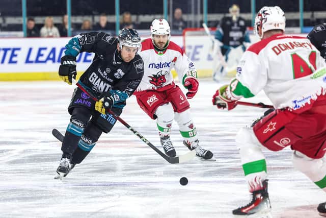 Belfast Giants’ David Goodwin with Cardiff Devils’ Joey Martin during Wednesday night’s Challenge Cup Final at the SSE Arena, Belfast. Photo by William Cherry/Presseye