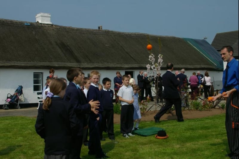 Spring was in the air as a juggler entertained pupils during the launch of the 2006 Carrick in Bloom initiative at the Andrew Jackson Centre. ct20-317fm