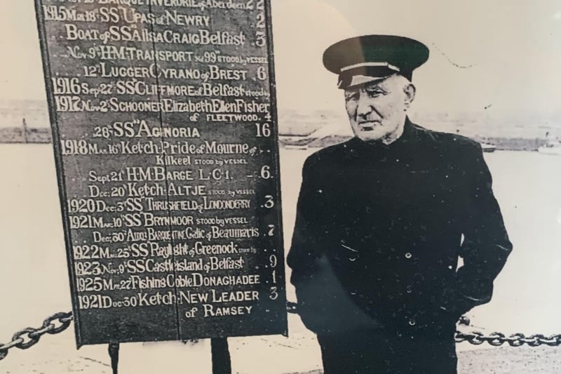 Donaghadee RNLI man with a list of 'services rendered' by the Donaghadee lifeboat of the RNLI
