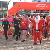 Portrush's East Strand was the venue for the Polar Plunge in aid of Special Olympics Ireland.