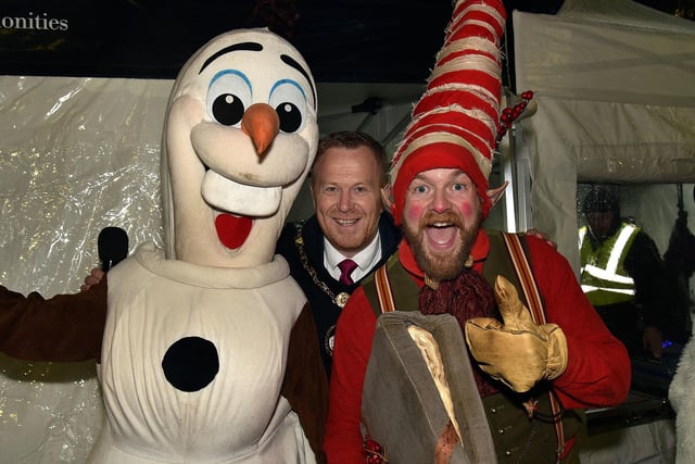 Lord Mayor of ABC Council, Councillor Paul Greenfield pictured with Olaf and one of Santa's elves. LM47-220.