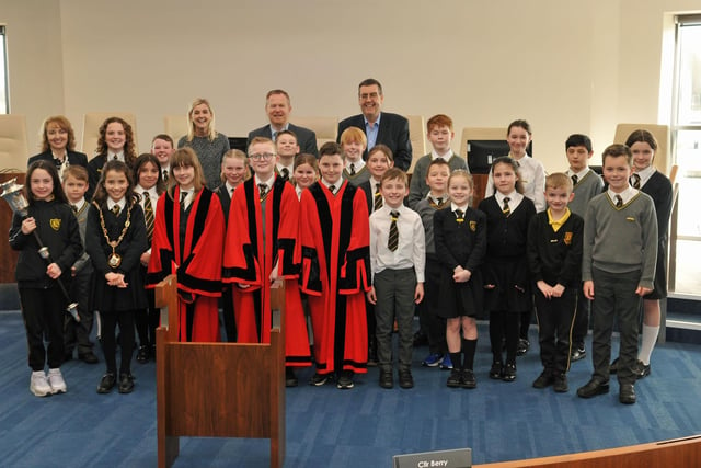 Pupils of King's Park Primary School enjoyed trying on councillors' robes and learning about the council and the role of the Lord Mayor during a visit to Craigavon Civic Centre. Pictured with members of the school council are Lord Mayor of Armagh City, Banbridge and Craigavon, Councillor Paul Greenfield and Alderman Stephen Moutray. Also Included are Miss Heather Brown, principal and Mrs Jill Buckley, teacher.