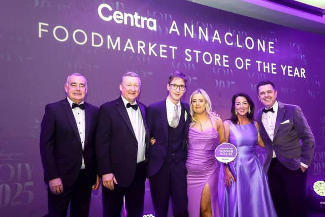 Receiving the Centra Foodmarket Store of the Year award at Musgrave NI’s Store of the Year event are Centra Annaclone owners and siblings Eoin and Sharon McPolin (centre). They are joined by (left to right) Musgrave NI’s Managing Director Trevor Magill and Centra Sales Manager Norman Bennett, plus Sarah Wilson from category sponsors Coca-Cola and host Pete Snodden.