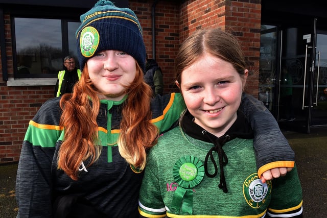 Cousins Maeve, left, and Eimear Mallon dressed in St Paul's gear for the club's St Patrick's Day parade. LM12-201.