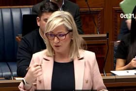 First Minister Michelle O'Neill answering questions on the scandal engulfing her party.