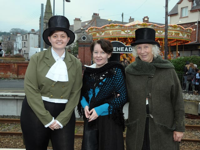 Greeting everyone at Whitehead Railway Station in 2014 were Wendy, Debbie and Catherine.