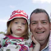 Lucy, Holly and David Scott at  the Old Lammas Fair in Ballycastle in 2010