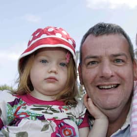 Lucy, Holly and David Scott at  the Old Lammas Fair in Ballycastle in 2010