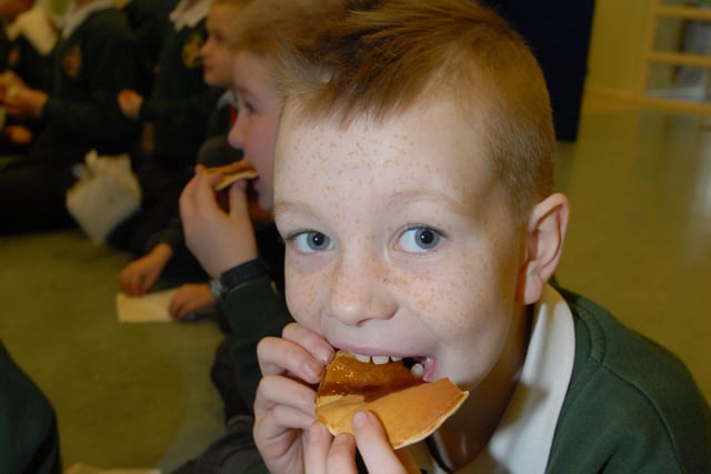 Jordan finishes off his pancake during Pancake Day at St MacNissi's Primary School in 2013.