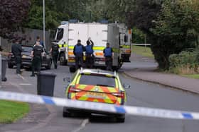 Police at the scene of a security alert following a report that a device has been left outside a property in the Oak Lodge area of Banbridge on Thursday afternoon. Picture: Press Eye