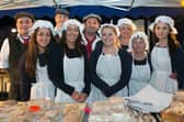 Jason Tweedie pictured with staff members at the 2013 Victorian Street Fair in Whitehead.  Photo: RM Studios