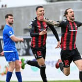 Declan Caddell celebrates his decisive goal for Crusaders against Dungannon Swifts in the Samuel Gelston's Whiskey Irish Cup semi-final at Mourneview Park