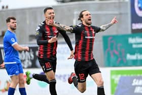 Declan Caddell celebrates his decisive goal for Crusaders against Dungannon Swifts in the Samuel Gelston's Whiskey Irish Cup semi-final at Mourneview Park