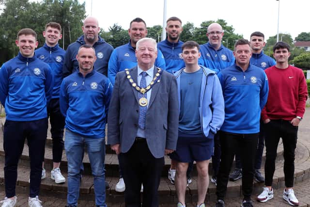 The Mayor, Cllr Steven Callaghan, with members of the playing, coaching and backroom staff of Limavady United Football Club. Credit Causeway Coast and Glens Council