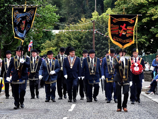The head of the RBP Last Saturday parade in Loughgall makes its way along Main Street. TH35.
