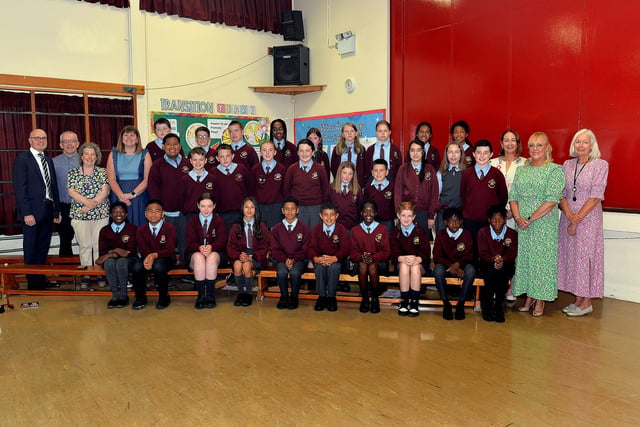 Primary 7 leavers at Ballyoran Primary School pictured on prize day with principal, Richard Woolsey, left, and staff. PT23-246. Photo by Tony Hendron